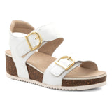 A white wedge sandal with two adjustable straps featuring gold-tone buckles, a cork-textured midsole, and a cream-colored outsole, shown against a plain white background.