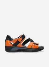Orange Wolky Desh 01055 closed-back adjustable sandal with cushioned straps and supportive sole, designed for comfort and style.