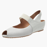 White open-toe sandal with brown insole on a white background