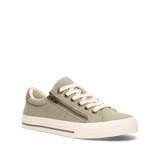 Green sneaker with a zipper on a white background