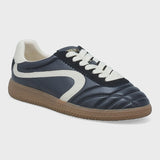 A single low-top sneaker shown from a three-quarters angle on a light gray background. The shoe features a black leather upper with a contrasting white side stripe, white laces, a white heel tab, and a brown gum sole.