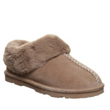 A single taupe suede slipper with a plush faux fur collar and white decorative stitching on the toe, shown against a plain white background.