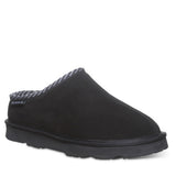 Black slipper with patterned interior on a white background