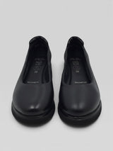 Strada Ara Berkeley black leather wedge pumps with round neckline and soft heel padding for comfortable work wear.