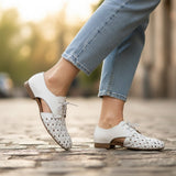 Strada MaraK Lolo white leather oxford shoes with cut-out detail and lace-up front.