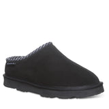 Black slipper with patterned interior on a white background