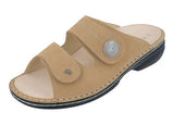Finn Comfort Sansibar 7457 women's tan slide sandal with cushioned footbed and open-toe design, perfect for casual summer wear.