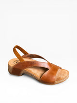 Brown sandal with cork sole on a white background