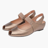 gold peep toe sandal on white background
